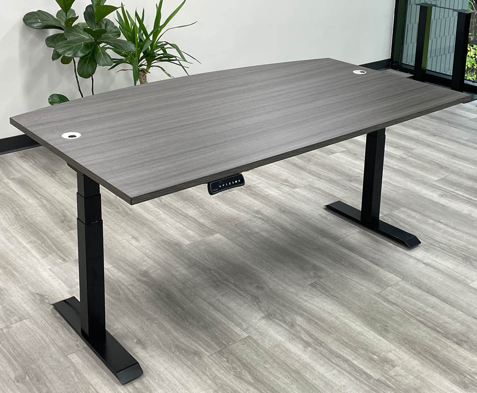 What is the warranty period for the desk's electrical components?